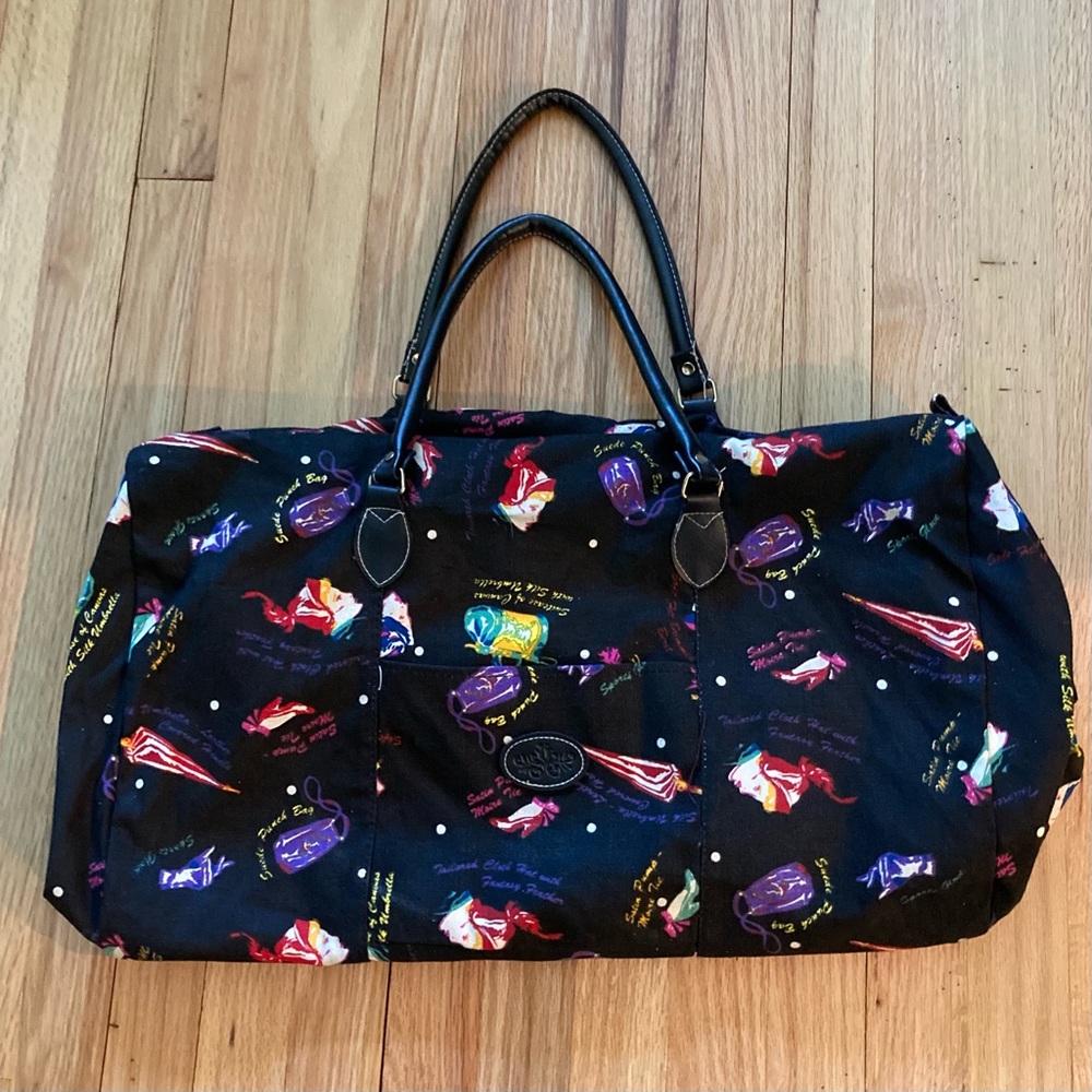 NWOT Large Travel tote. Lightweight canvas with top zipper closure.